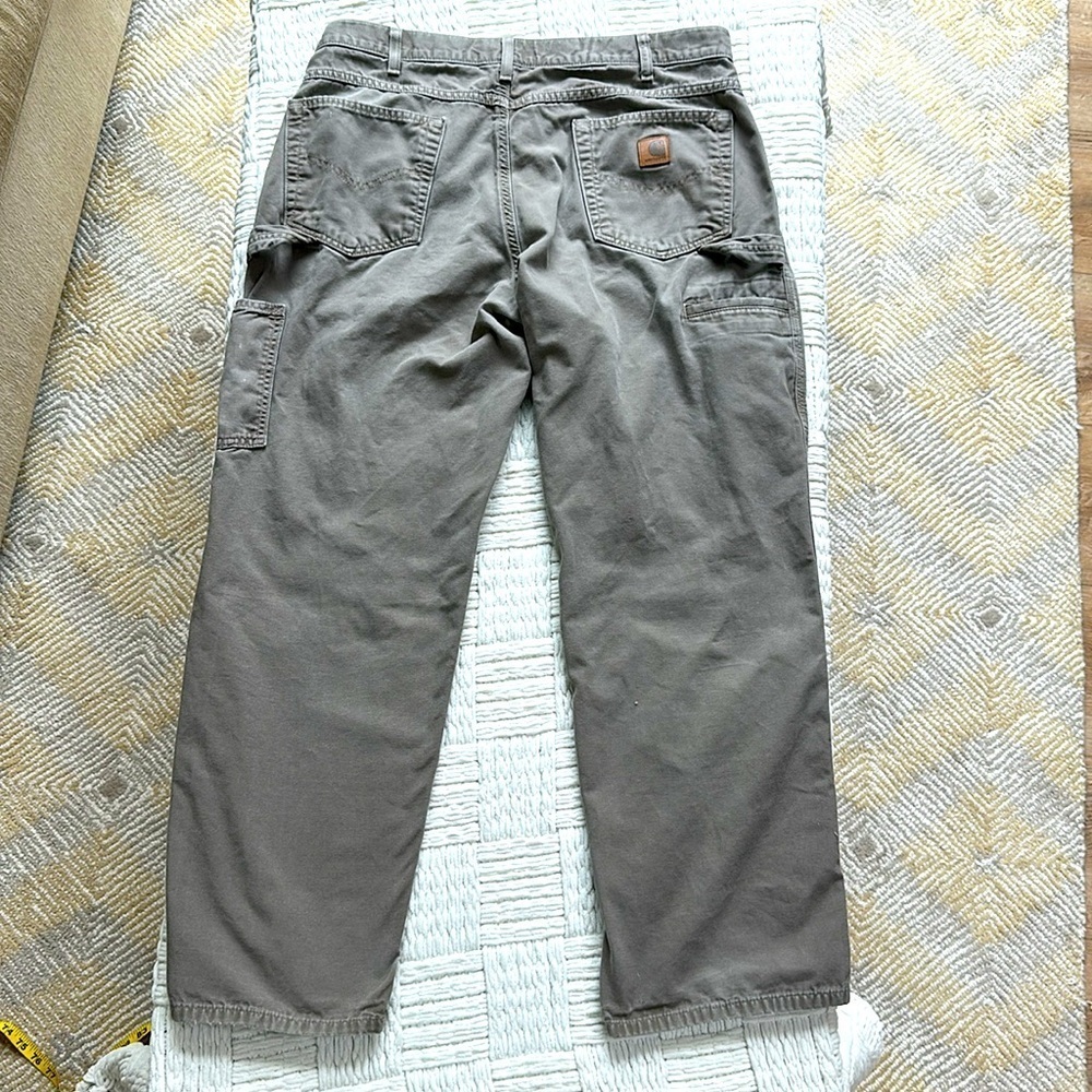 Carhartt distressed carpenter pants with some stains and holes. #10015 - Picture 6 of 11